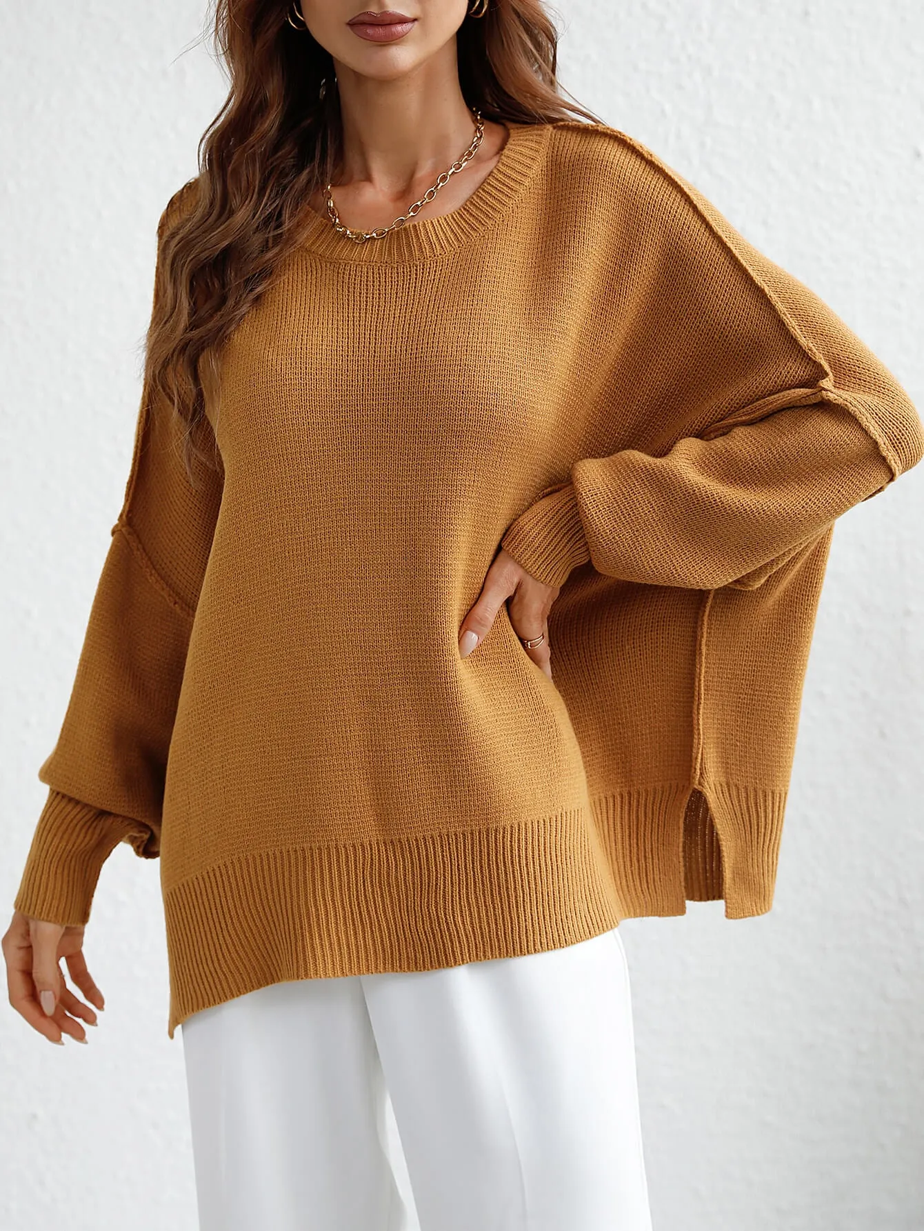 Exposed Seam Dropped Shoulder Slit Sweater