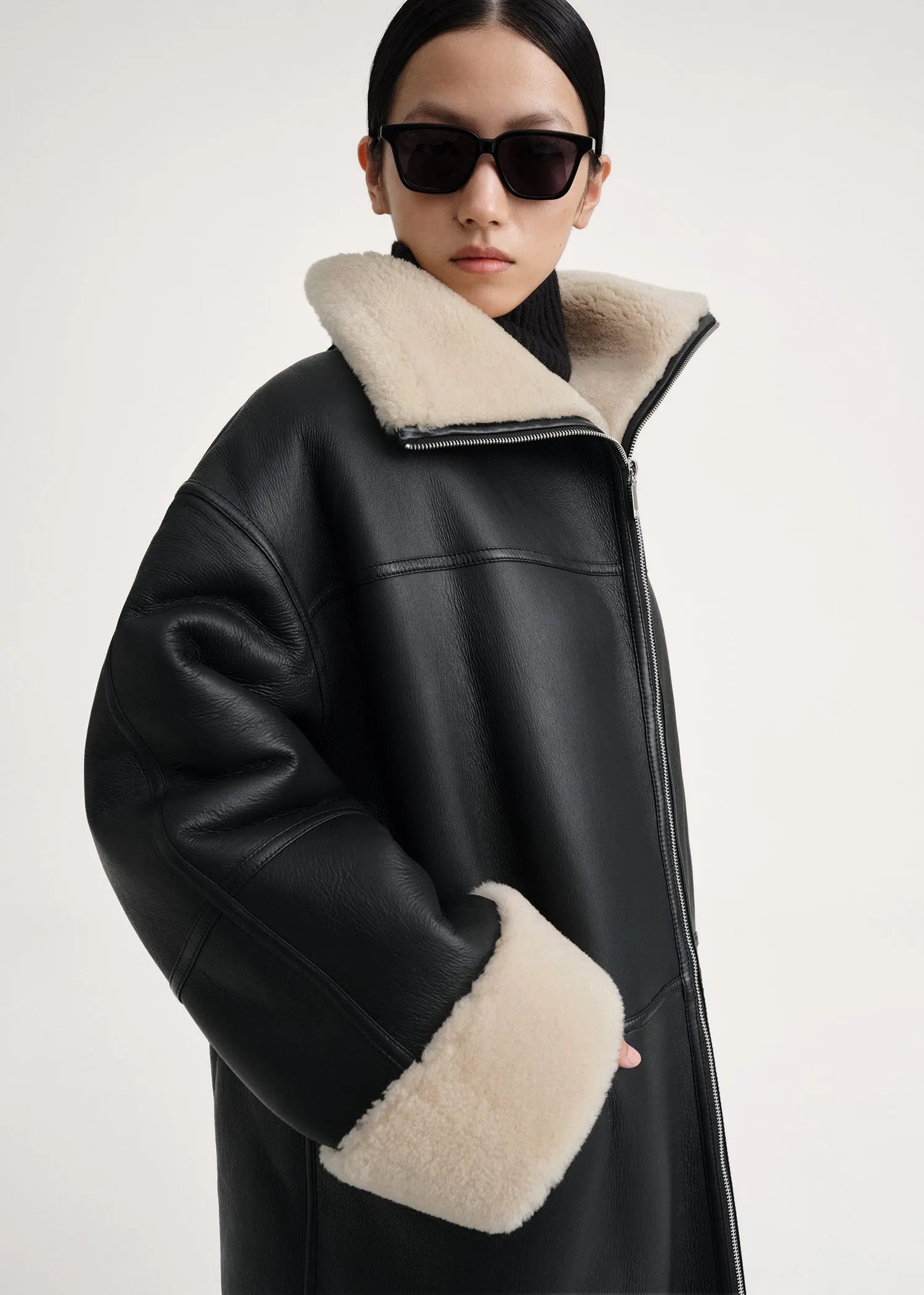 Signature shearling coat black/off-white